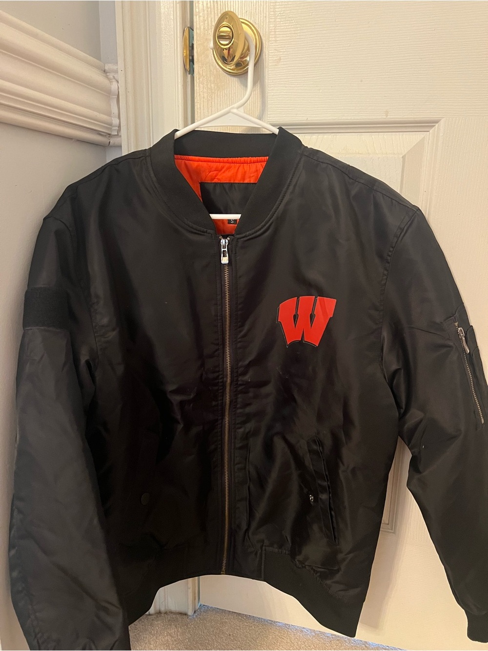 Black Bomber Jacket with Red 'W' Patch